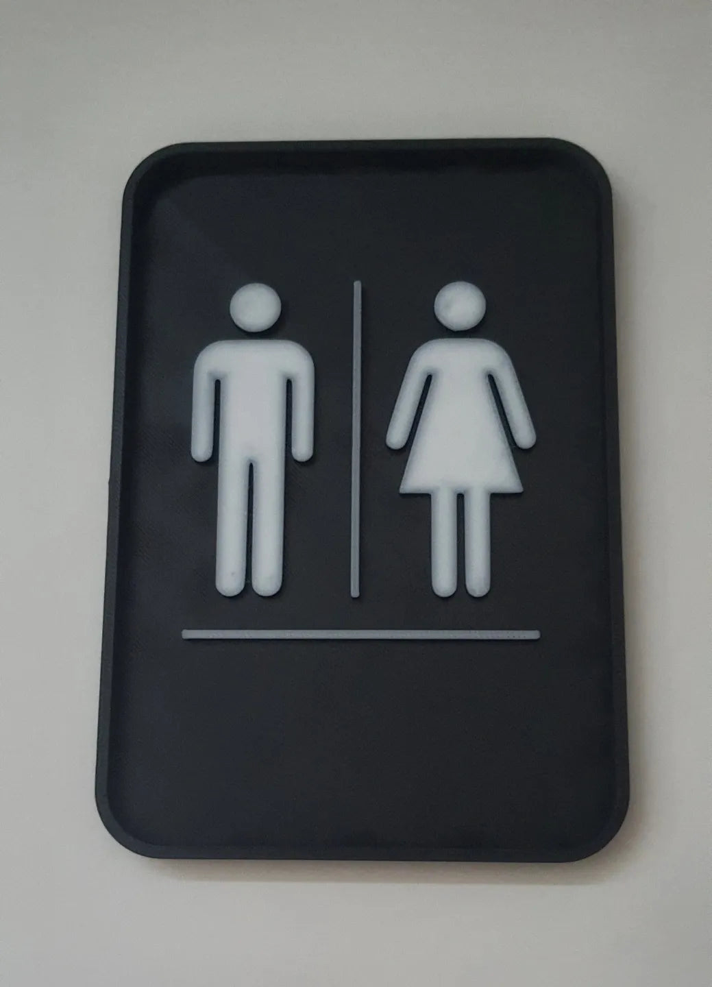 Panneau de porte de toilettes