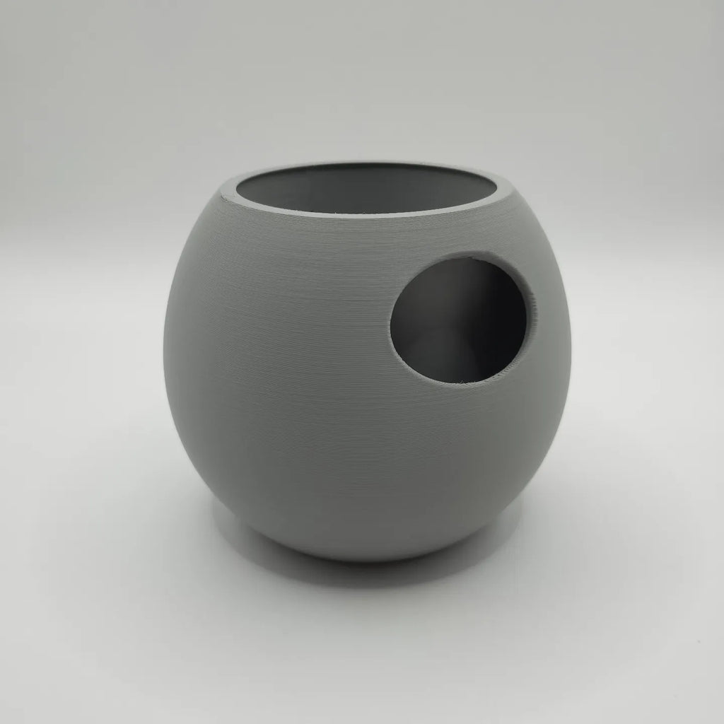 Pot à plantes auto-arrosant élégant