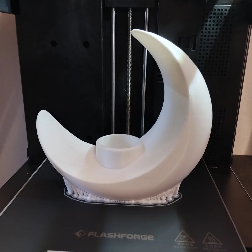 Objet décoratif en forme de croissant de lune  vase  récipient